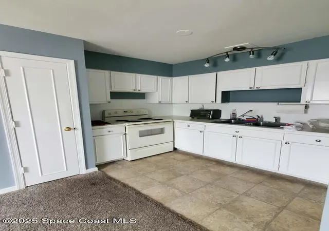 Photo 4 of Condo for sale at 125 E Colonial Ct #D, Indian Harbour Beach, FL 32937 | MLS# 1043666 | Listing updated on 2026-09-02