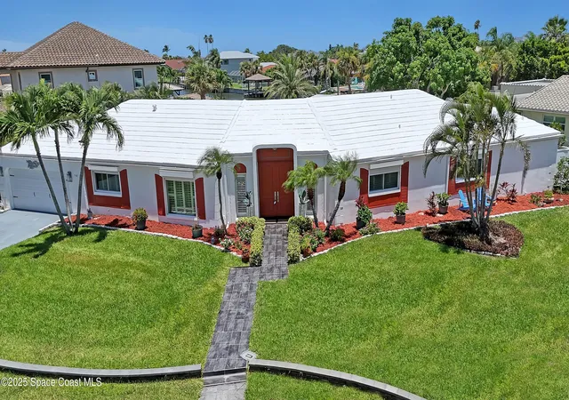 2nd image of 55 Country Club Rd, Cocoa Beach, FL 32931 | MLS# 1050894