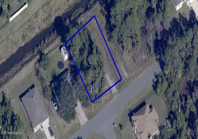 Photo 2 of Land for sale at 657 Paigo St Se, Palm Bay, FL 32909 | MLS# 1055474 | Listing updated on 2026-08-25