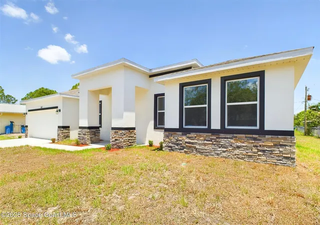 Photo 3 of Single family home for sale at 692 Mistletoe St Sw, Palm Bay, FL 32908 | MLS# 1056545 | Listing updated on 2026-09-18
