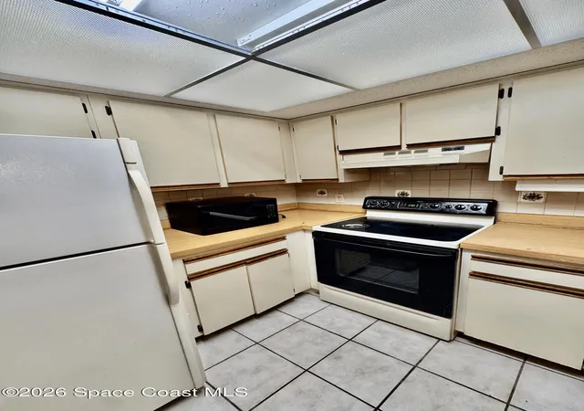 Photo 3 of Condo for sale at 915 Sonesta Ave Ne #102, Palm Bay, FL 32905 | MLS# 1057979 | Listing updated on 2026-09-07