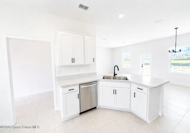 Photo 3 of Sale Pending at 1495 Kylar Dr Nw, Palm Bay, FL 32907 | MLS# 1060894 | Listing updated on 2026-07-01