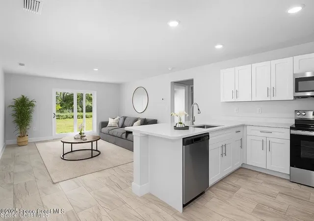 Photo 3 of Single family home for sale at 480 Scanlon Rd Sw, Palm Bay, FL 32908 | MLS# 1063305 | Listing updated on 2026-09-17
