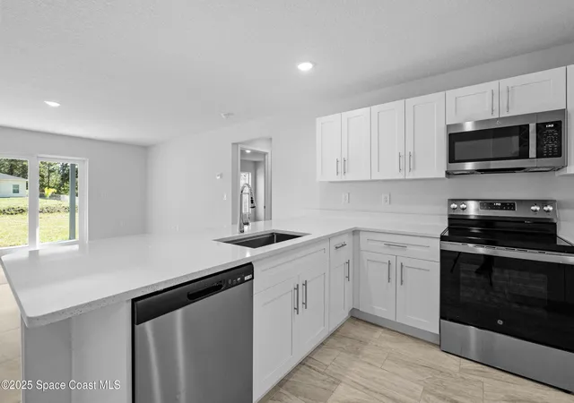 Photo 3 of Single family home for sale at 480 Scanlon Rd SW, Palm Bay, FL 32908 | MLS# 1063305 | Listing updated on 2026-09-17