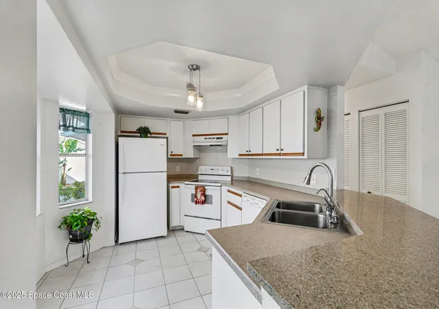 Photo 4 of Townhouse for sale at 904 Maplewood Ct, Melbourne, FL 32940 | MLS# 1064151 | Listing updated on 2026-09-04