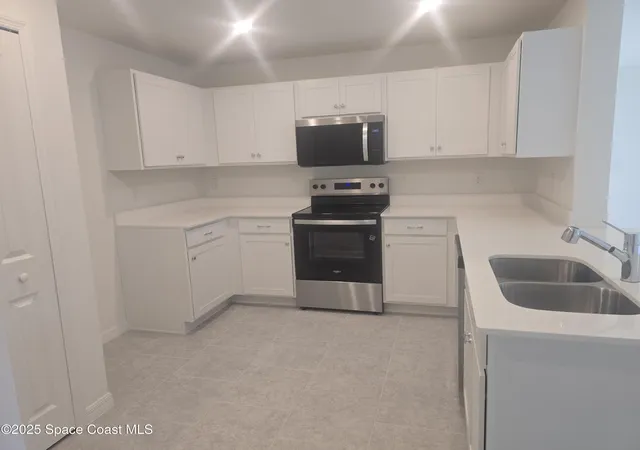 Photo 2 of Single family home for sale at 961 Sw Richmond Cir, Palm Bay, FL 32908 | MLS# 1063979 | Listing updated on 2026-09-04