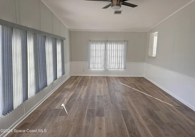 5th image of 606 Dolphin Cir, Barefoot Bay, FL 32976 | MLS# 1068380