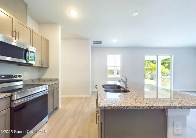 Photo 4 of Single family home for sale at 1085 SW Harlingen Rd, Palm Bay, FL 32908 | MLS# 1067403 | Listing updated on 2026-06-29