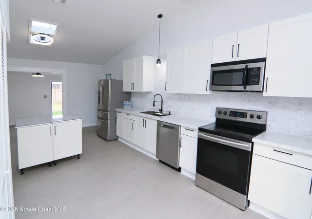 Photo 3 of Single family home for sale at 711 Kempten St Nw, Palm Bay, FL 32907 | MLS# 1068130 | Listing updated on 2026-09-17