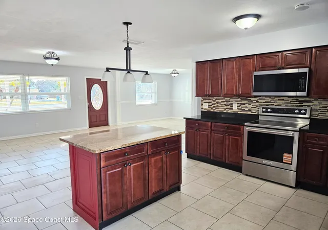 Photo 3 of Single family home for sale at 435 S Courtenay Pkwy, Merritt Island, FL 32952 | MLS# 1069059 | Listing updated on 2026-07-18