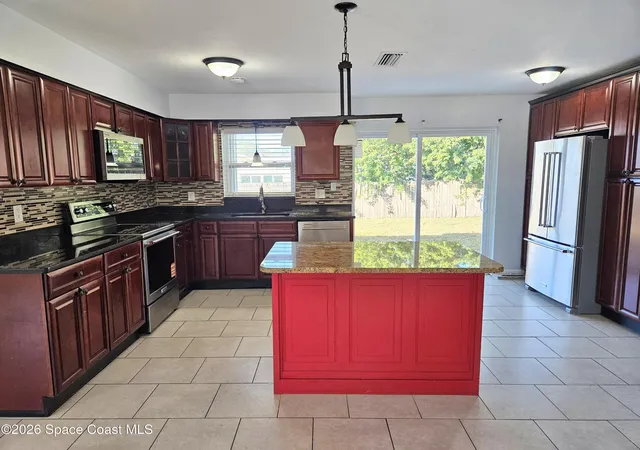 Photo 4 of Single family home for sale at 435 S Courtenay Pkwy, Merritt Island, FL 32952 | MLS# 1069059 | Listing updated on 2026-07-18