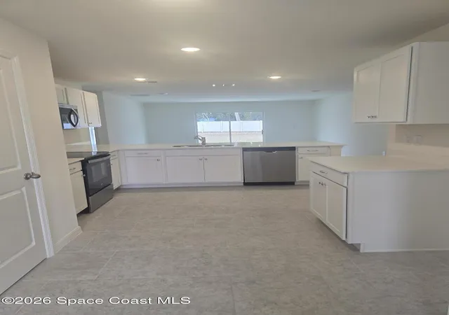 Photo 3 of Single family home for sale at 981 SW Richmond Cir, Palm Bay, FL 32908 | MLS# 1069159 | Listing updated on 2026-10-07