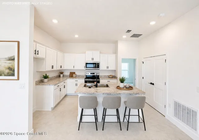 Photo 3 of Single family home for sale at 1028 Soleway Ave Nw, Palm Bay, FL 32907 | MLS# 1070627 | Listing updated on 2026-09-14