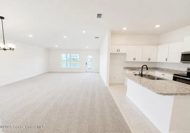 Photo 3 of Single family home for sale at 1028 Soleway Ave NW, Palm Bay, FL 32907 | MLS# 1070627 | Listing updated on 2026-09-14