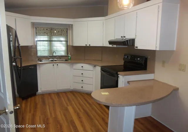 5th image of 630 Wedelia Dr, Barefoot Bay, FL 32976 | MLS# 1072691