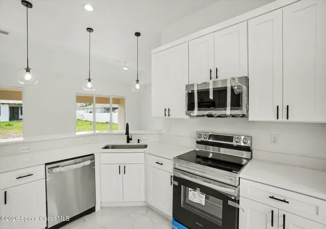 Photo 1 of Single family home for sale at 3267 Halacka Ave SE, Palm Bay, FL 32909 | MLS# 1073831 | Listing updated on 2026-10-26