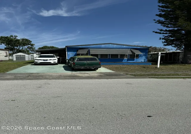 Photo 3 of Manufactured home for sale at 1805 Mango St Ne, Palm Bay, FL 32905 | MLS# 1073408 | Listing updated on 2026-09-18