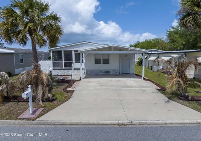 1st image of 971 Laurel Cir, Barefoot Bay, FL 32976 | MLS# 1074482