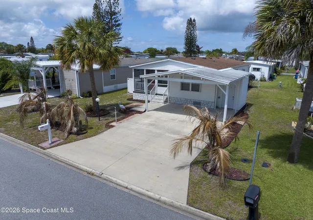3rd image of 971 Laurel Cir, Barefoot Bay, FL 32976 | MLS# 1074482