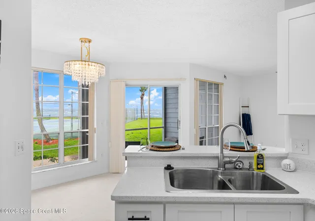 Listing Photo 5 - Condo for sale in building located at 7310 N Hwy 1, Port St. John, FL 32927 - Unit #101