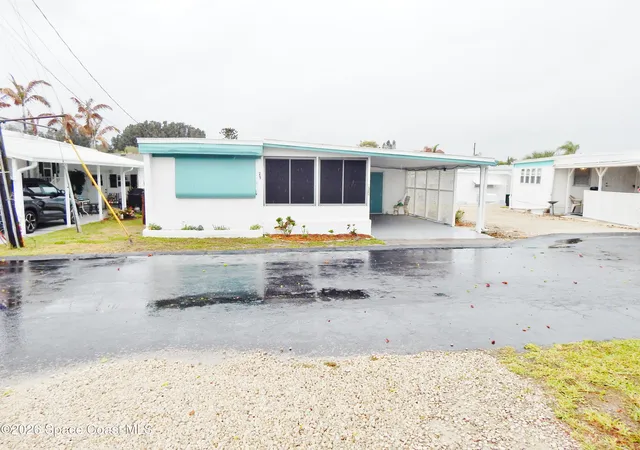 Photo 1 of Manufactured home for sale at 1328 Turkey Crk Dr Ne, Palm Bay, FL 32905 | MLS# 1073998 | Listing updated on 2026-04-24