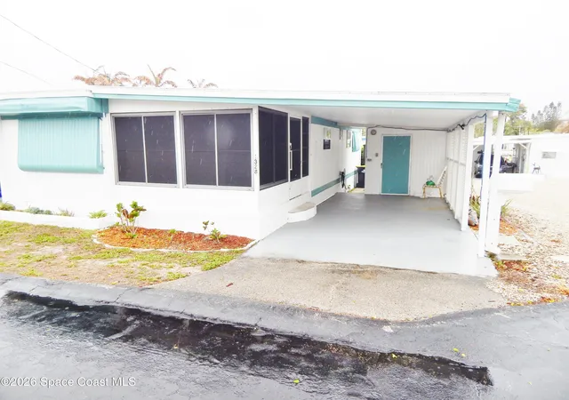 Photo 2 of Manufactured home for sale at 1328 Turkey Crk Dr Ne, Palm Bay, FL 32905 | MLS# 1073998 | Listing updated on 2026-04-24