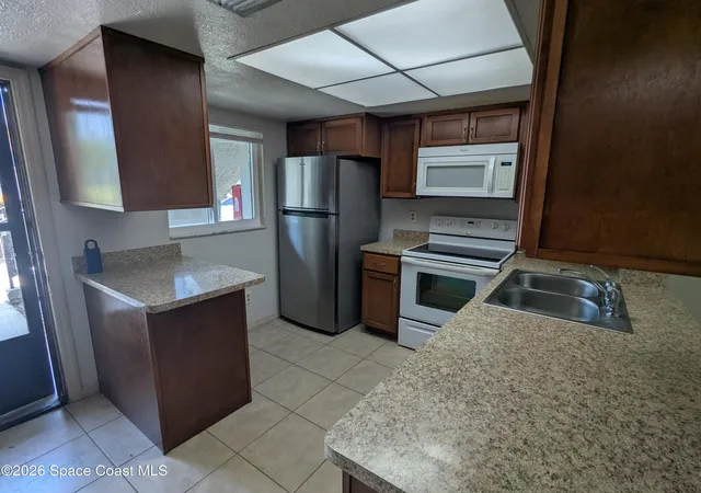 Photo 3 of Condo for sale at 1600 University Ln #1504, Cocoa, FL 32922 | MLS# 1074275 | Listing updated on 2026-09-11