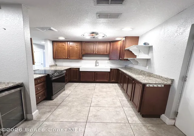 Listing Photo 4 - Condo for sale in building located at 165 Treasure St, Merritt Island, FL 32952 - Unit #A3-105