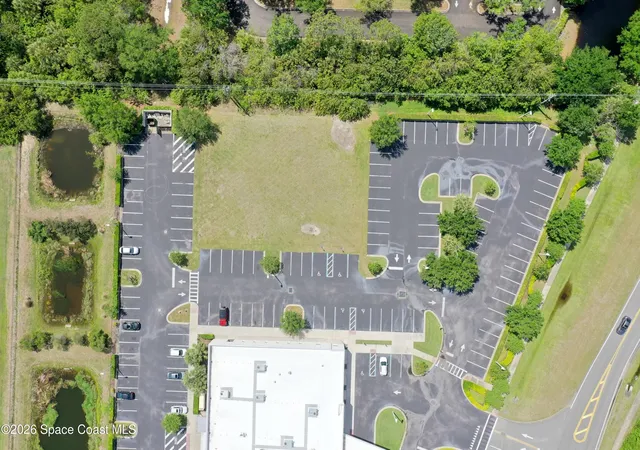 Photo 3 of Land for sale at 7965 Spyglass Hl Rd, Melbourne, FL 32940 | MLS# 1075907 | Listing updated on 2026-04-29