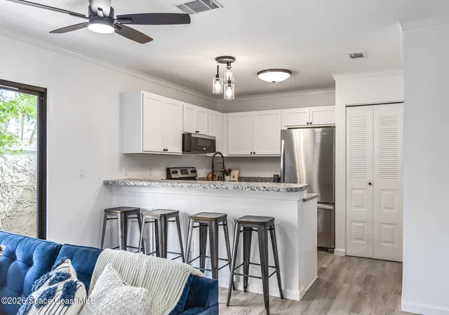 Photo 4 of Townhouse for sale at 1411 Sheafe Ave NE #101, Palm Bay, FL 32905 | MLS# 1076348 | Listing updated on 2026-09-09
