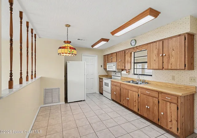 Photo 4 of Sale Pending at 571 Firestone St NE, Palm Bay, FL 32907 | MLS# 1077626 | Listing updated on 2026-09-05