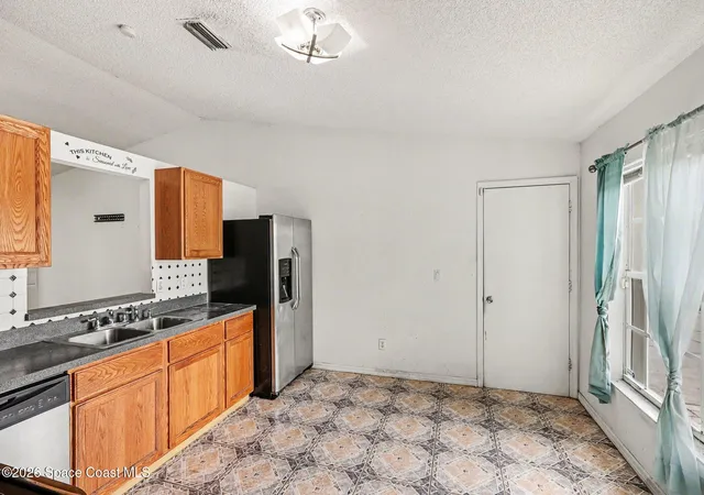 Photo 3 of Sale Pending at 1893 Firethorn Rd Nw, Palm Bay, FL 32907 | MLS# 1077178 | Listing updated on 2026-07-11