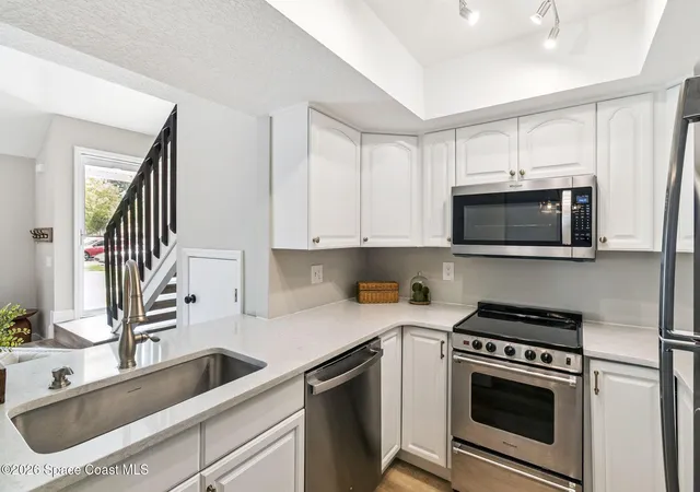 Photo 1 of Townhouse for sale at 718 Fairway Dr, Melbourne, FL 32940 | MLS# 1077281 | Listing updated on 2026-08-26