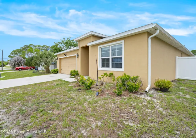 Photo 3 of Single family home for sale at 104 Carmelite Ave NW, Palm Bay, FL 32907 | MLS# 1077359 | Listing updated on 2026-09-14