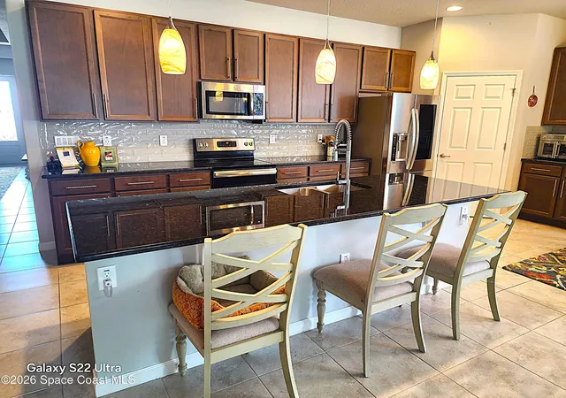 Photo 4 of Sale Pending at 988 Corbin Cir SW, Palm Bay, FL 32908 | MLS# 1077385 | Listing updated on 2026-09-08