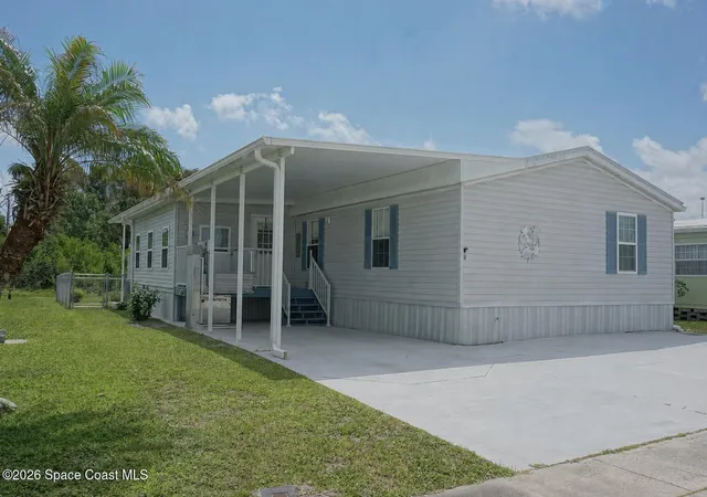 Photo 1 of Manufactured home for sale at 1819 Seagrape St Ne, Palm Bay, FL 32905 | MLS# 1077629 | Listing updated on 2026-07-19