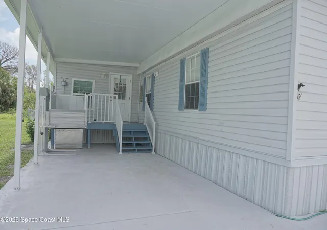 Photo 2 of Manufactured home for sale at 1819 Seagrape St Ne, Palm Bay, FL 32905 | MLS# 1077629 | Listing updated on 2026-07-19