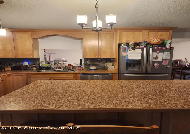 Photo 4 of Single family home for sale at 913 Commerce Rd SE, Palm Bay, FL 32909 | MLS# 1077817 | Listing updated on 2026-09-11
