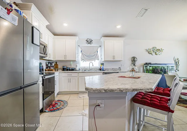 3rd image of 694 Moment St, Cocoa, FL 32926 | MLS# 1079012