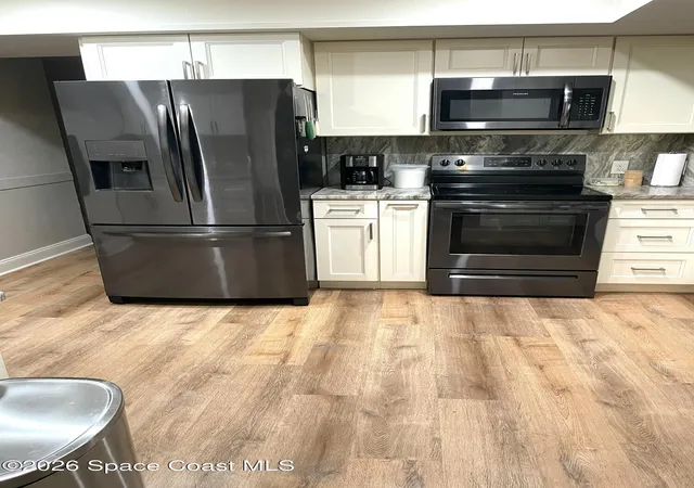 Photo 2 of Single family home for sale at 1805 Figtree Dr, Titusville, FL 32780 | MLS# 1078170 | Listing updated on 2026-09-08