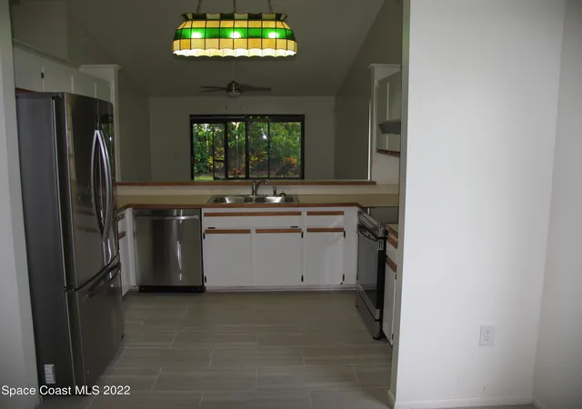 Photo 4 of Single family home for sale at 1456 N Brook Dr, Melbourne, FL 32935 | MLS# 1078714 | Listing updated on 2026-06-20