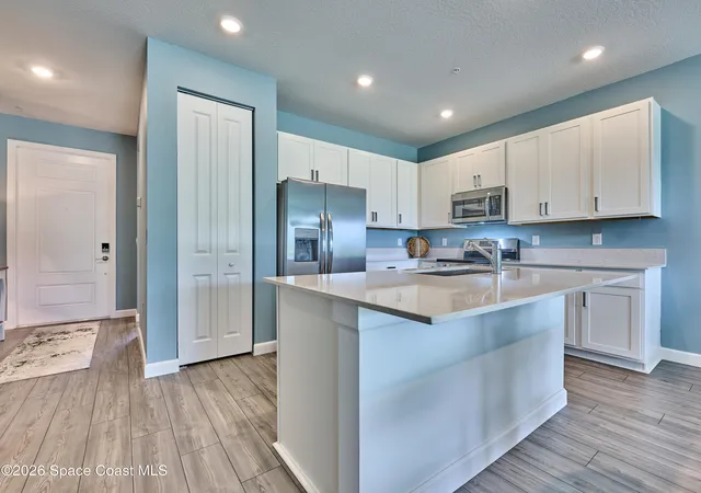 Photo 4 of Townhouse for sale at 1857 Cerulean Dr NW, Palm Bay, FL 32907 | MLS# 1078521 | Listing updated on 2026-07-23