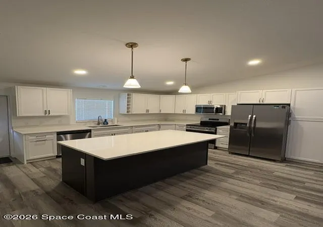 Photo 3 of Single family home for sale at 965 N Singleton Ave, Titusville, FL 32796 | MLS# 1078811 | Listing updated on 2026-06-02