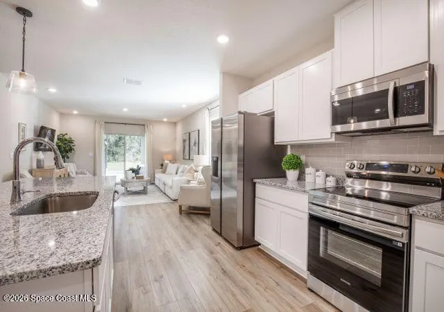 Photo 2 of Single family home for sale at 1407 Needle Palm Dr, Edgewater, FL 32132 | MLS# 1079104 | Listing updated on 2026-08-19