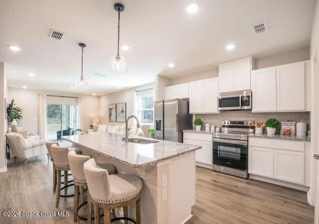 Photo 3 of Single family home for sale at 1407 Needle Palm Dr, Edgewater, FL 32132 | MLS# 1079104 | Listing updated on 2026-08-19