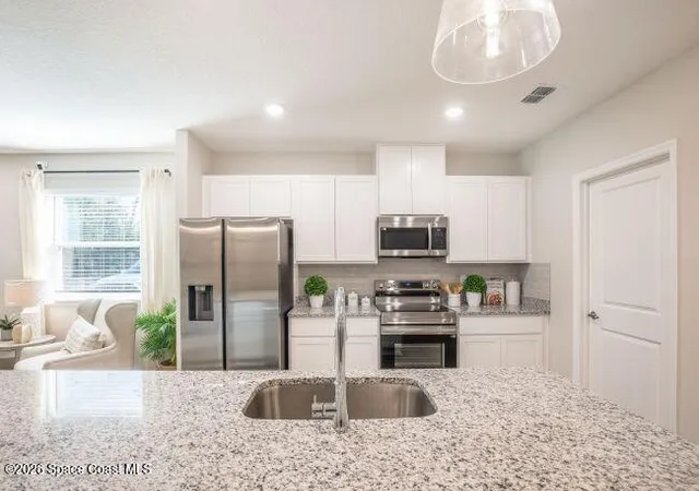 Photo 4 of Single family home for sale at 1407 Needle Palm Dr, Edgewater, FL 32132 | MLS# 1079104 | Listing updated on 2026-08-19