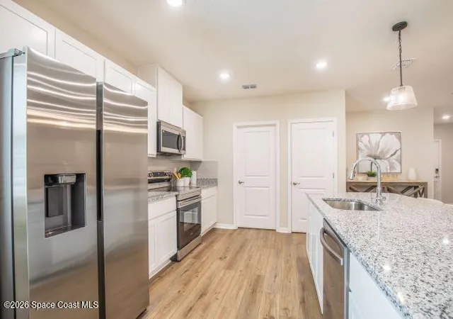 Photo 5 of Single family home for sale at 1407 Needle Palm Dr, Edgewater, FL 32132 | MLS# 1079104 | Listing updated on 2026-08-19