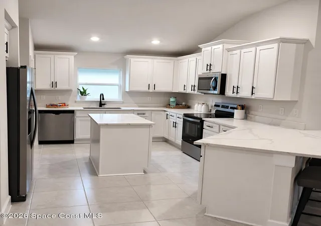 Photo 3 of Sale Pending at 1015 Kylar Dr Nw, Palm Bay, FL 32907 | MLS# 1079384 | Listing updated on 2026-07-03