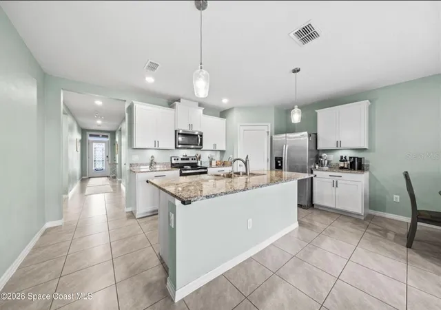 Photo 4 of Single family home for sale at 1401 Mcfarland Dr, Melbourne, FL 32904 | MLS# 1079445 | Listing updated on 2026-09-03