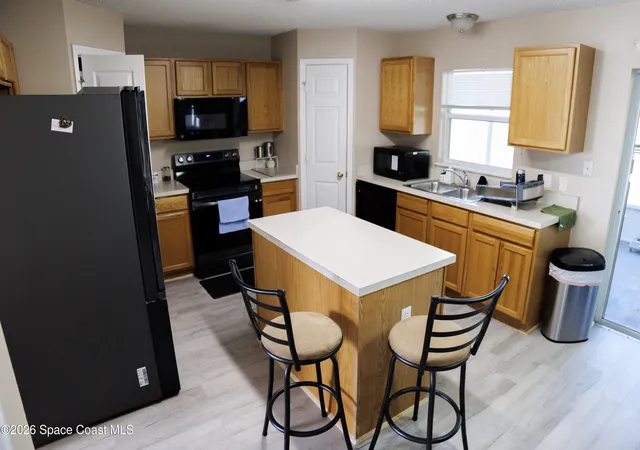 Photo 3 of Single family home for sale at 569 Macon Dr E, Titusville, FL 32780 | MLS# 1079397 | Listing updated on 2026-09-12